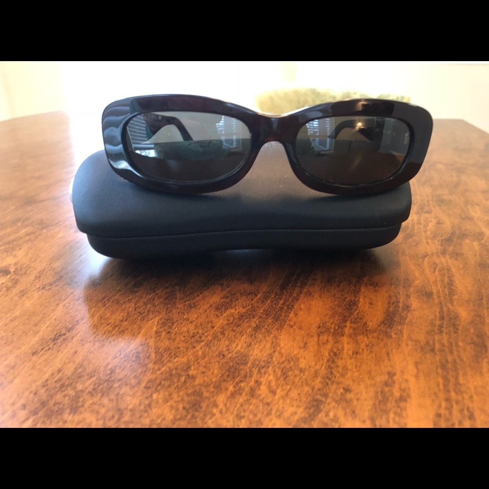 Dark brown Chanel sunglasses.